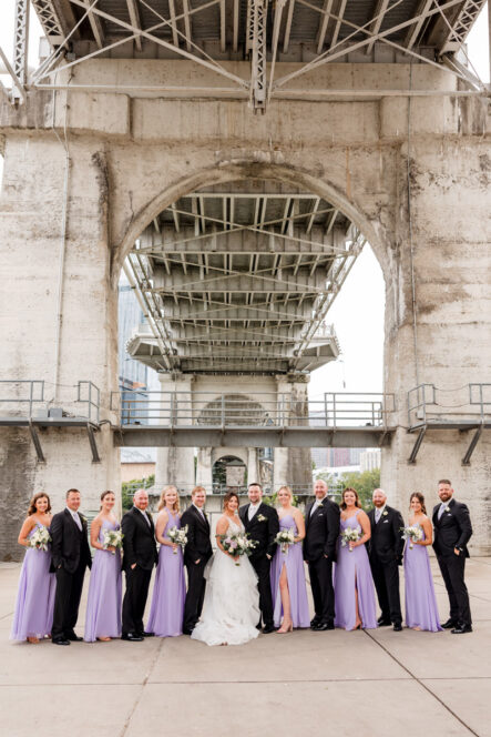 Bride and Groom with Wedding Party under the Bridge in Nashville