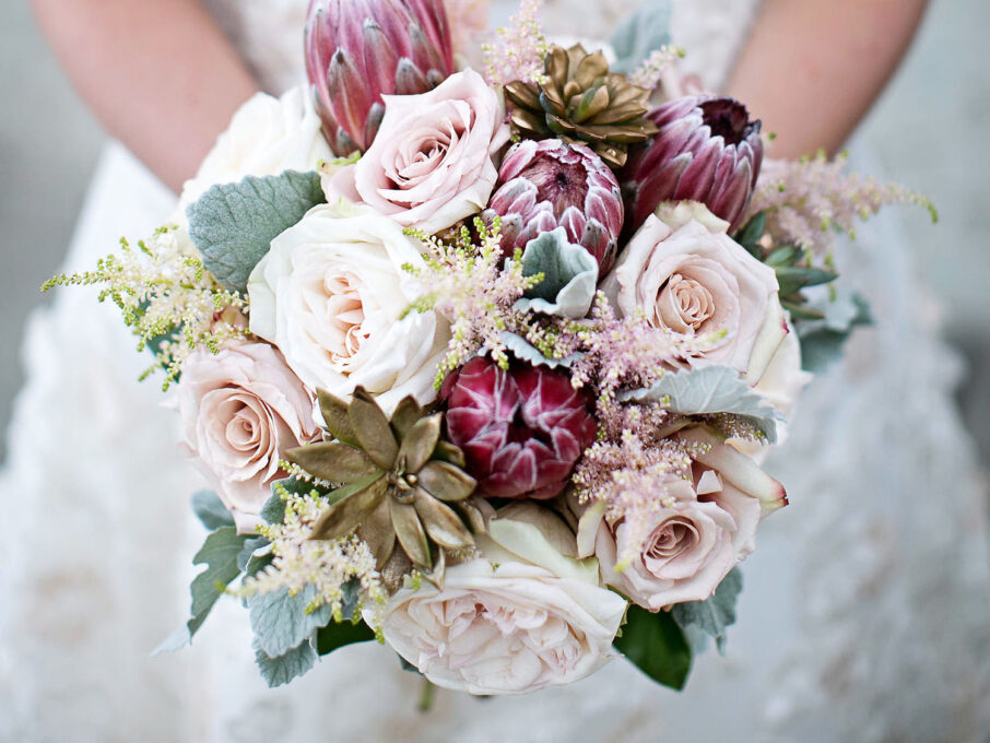 Romantic pink bridal bouquet with mixed booms and succulents