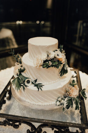 Classic three tier textured white wedding cake at the Bridge Building, a downtown Nashville wedding venue